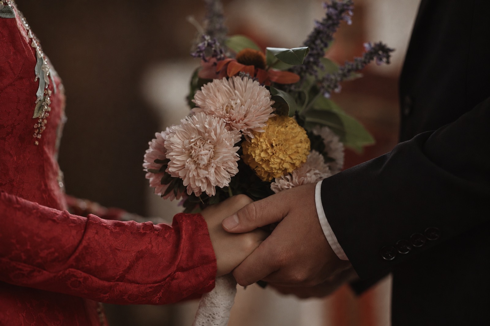 Thu with her bouquet at the barn wedding in Rougemont, Quebec