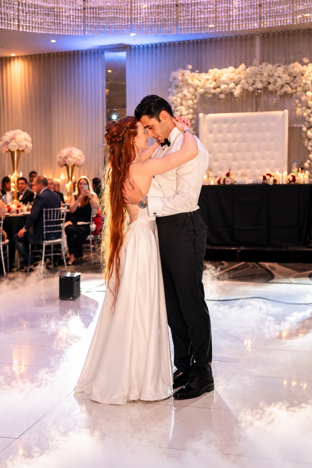 Jenna and Pouya embracing on the dance floor