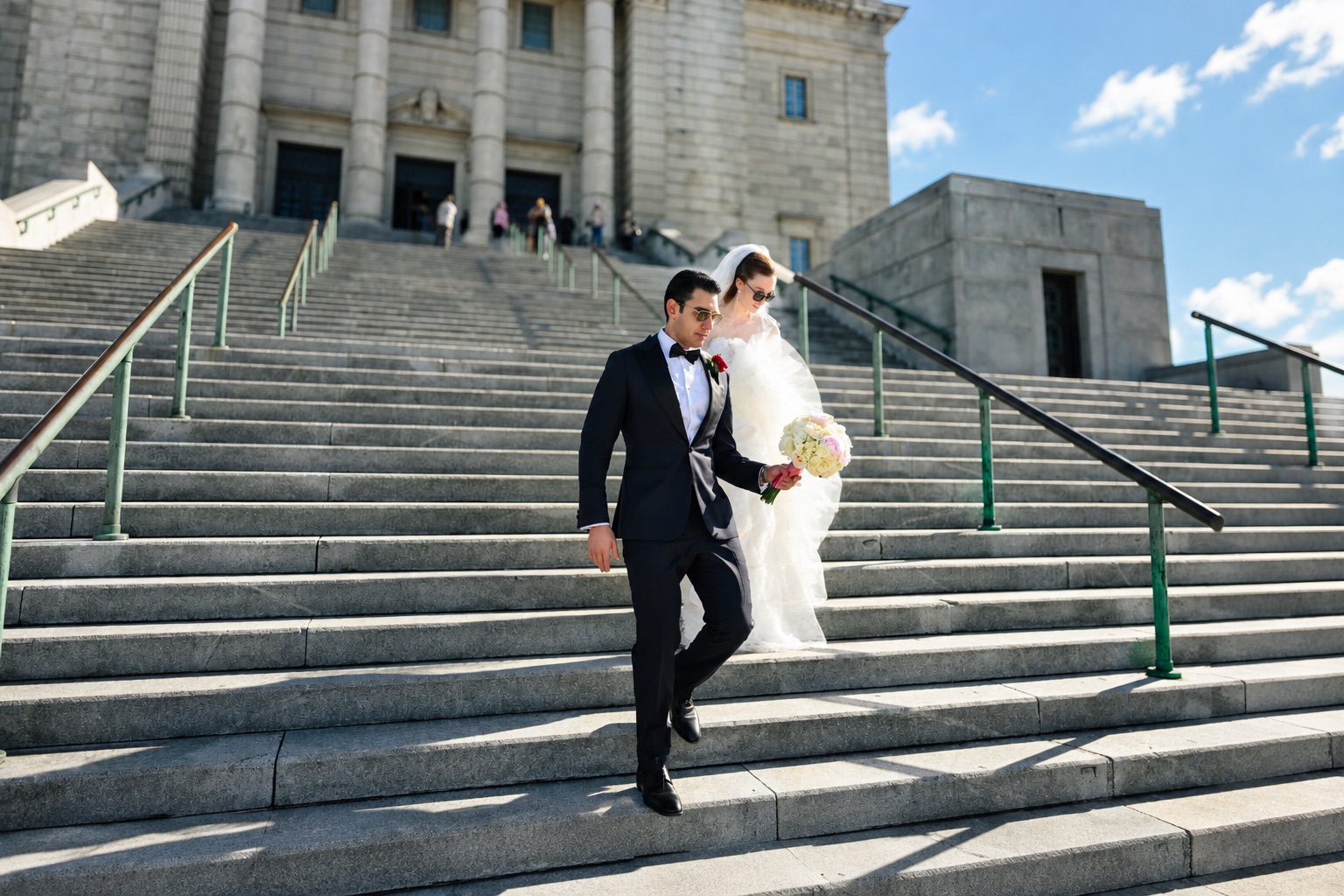 Jenna and Pouya walking down the grand steps