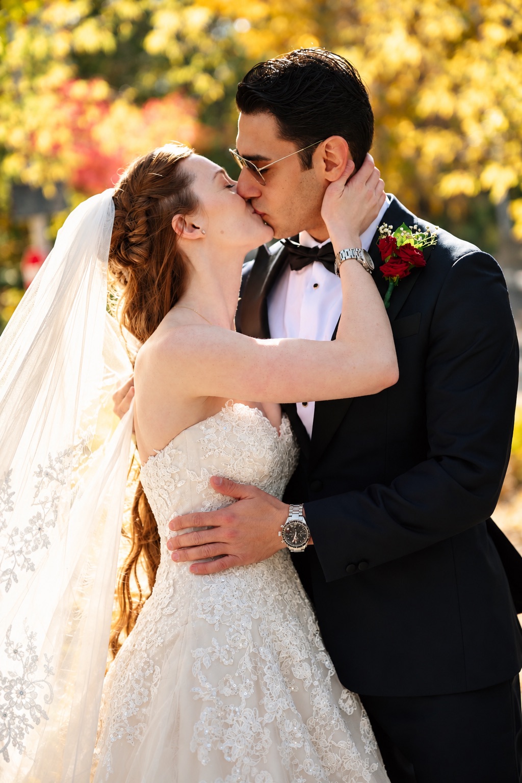 Jenna and Pouya kissing in the autumn light