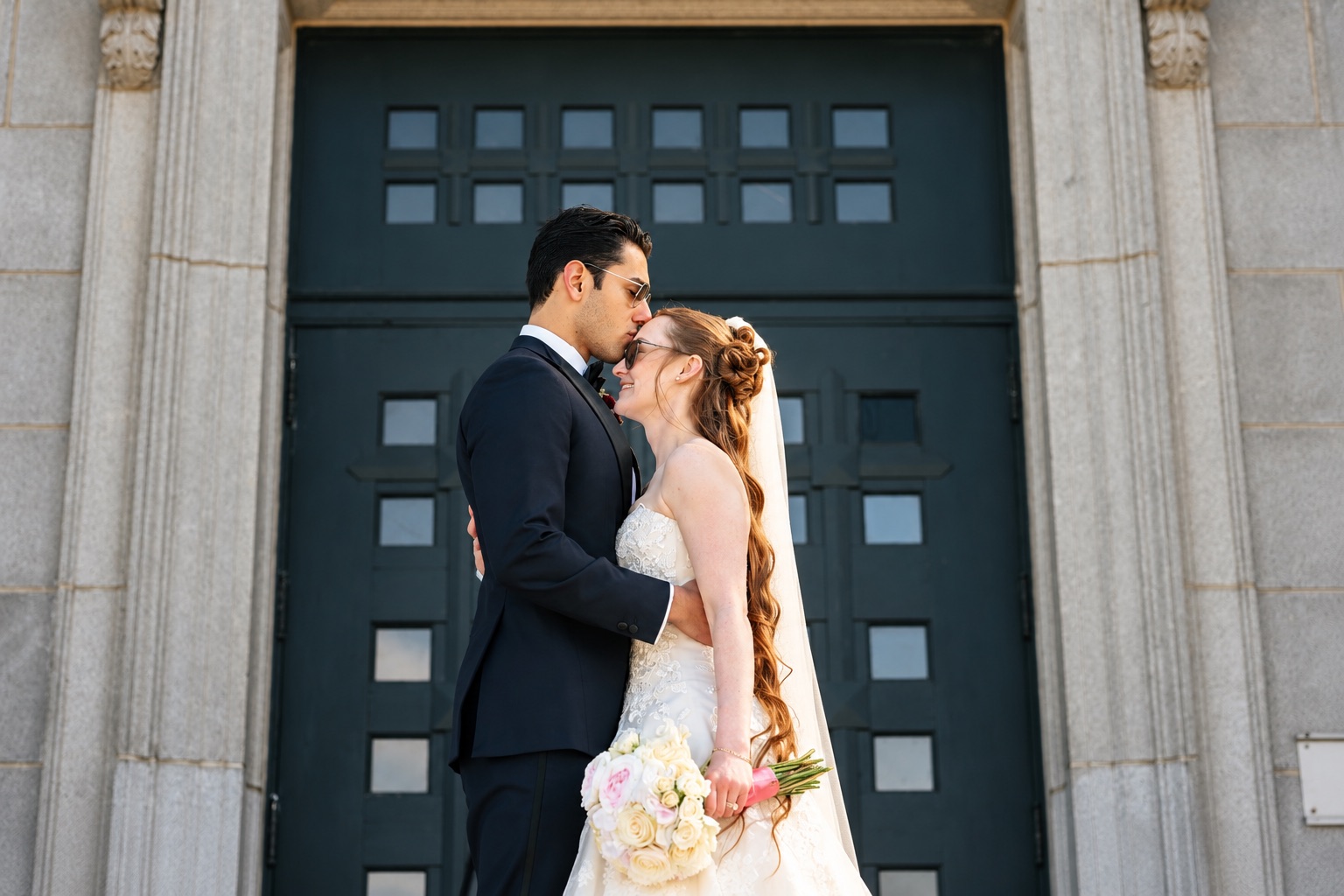 Jenna and Pouya at the stone entrance