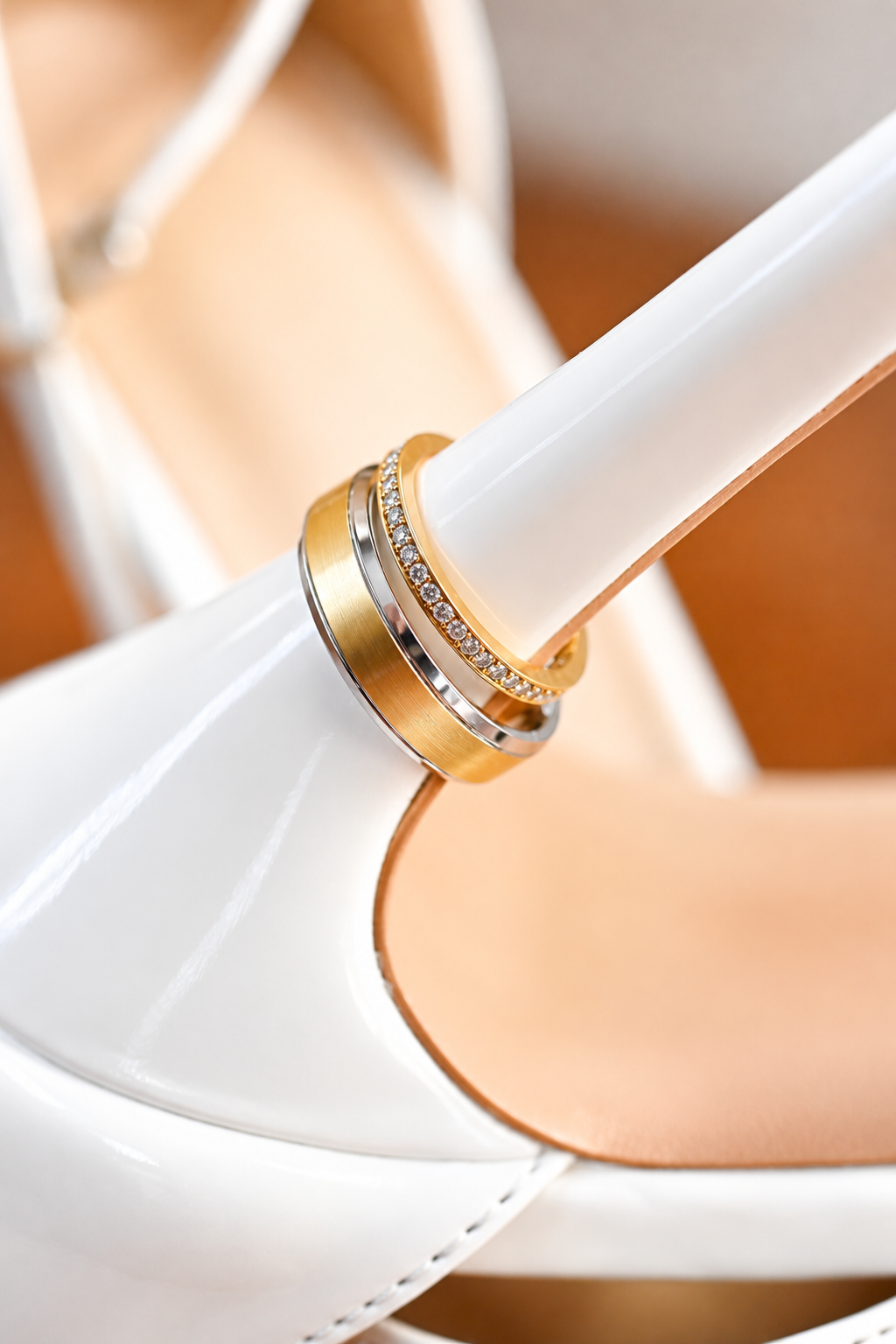 Wedding rings on a white heel