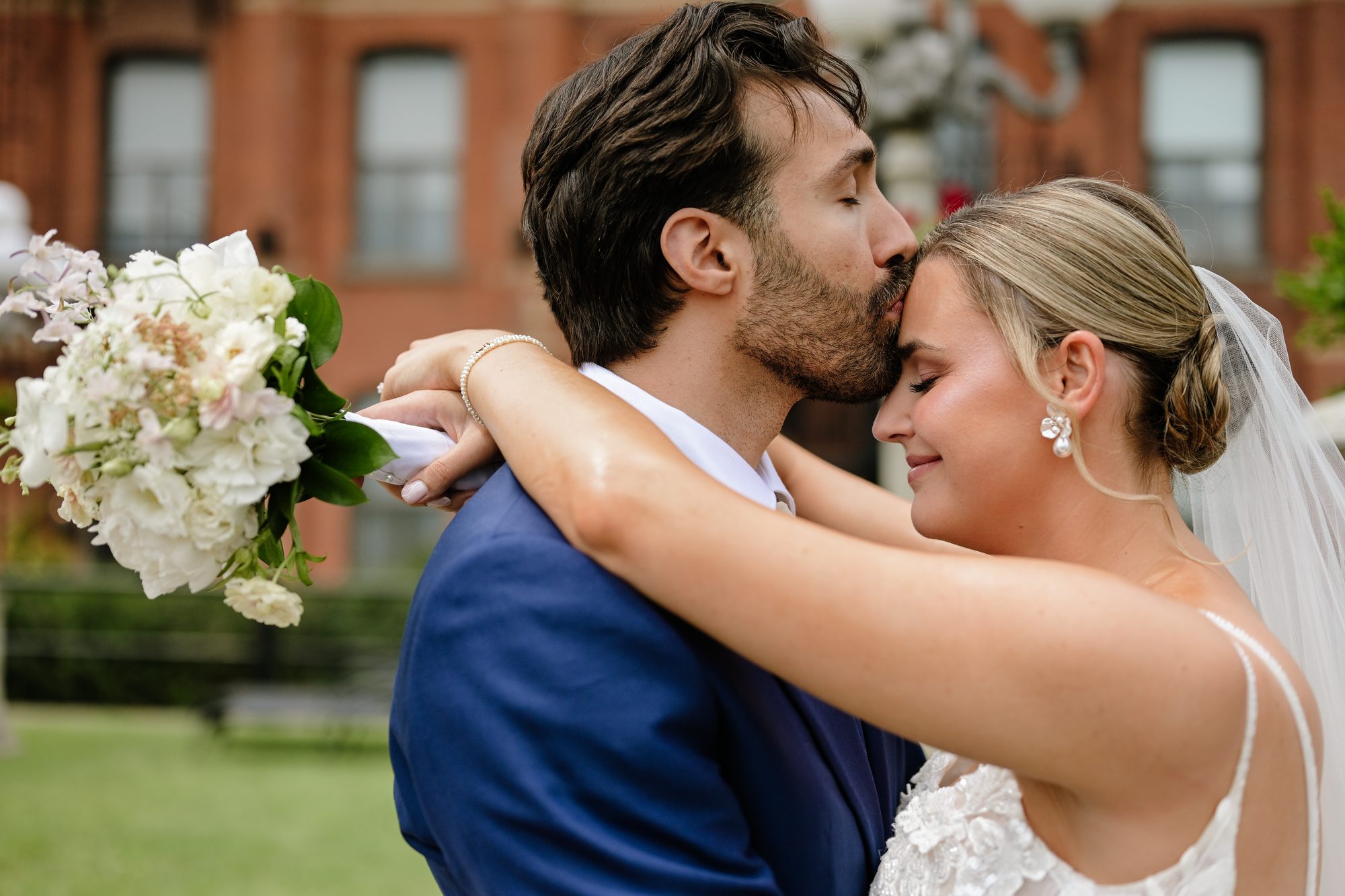 Laurie and Shadi embracing in the garden