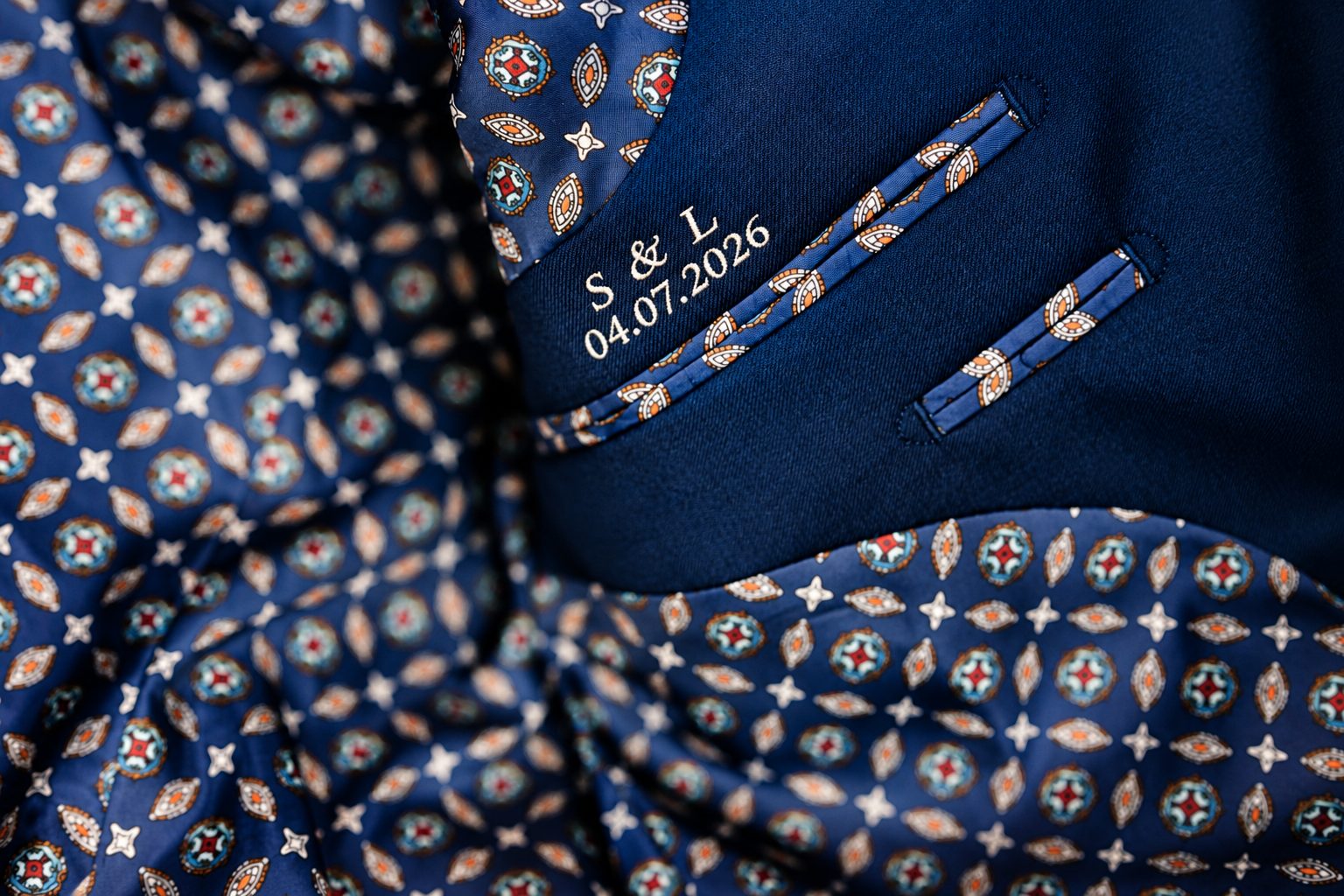 The date embroidered in Shadi's jacket
