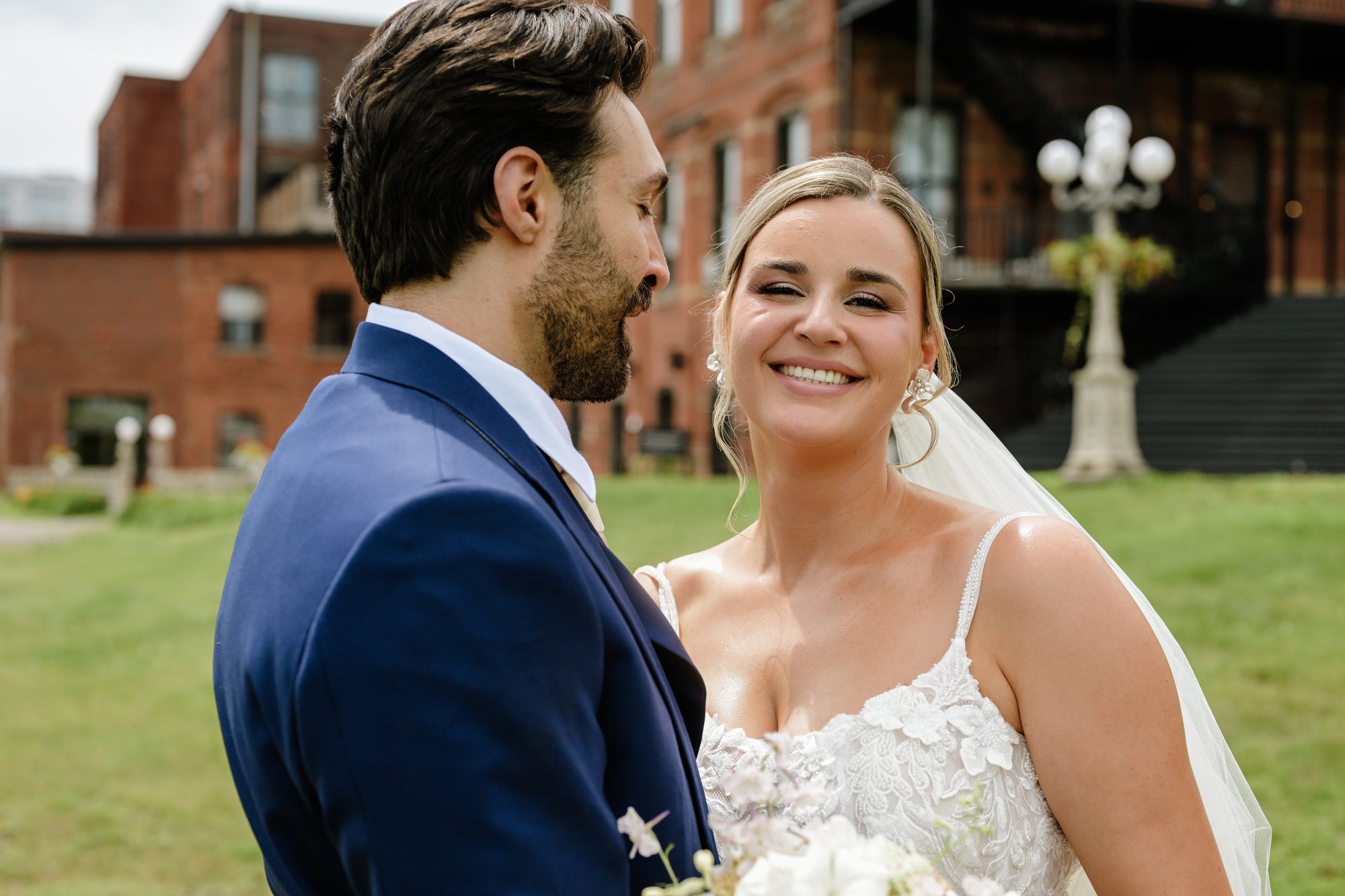 Laurie smiling at Shadi