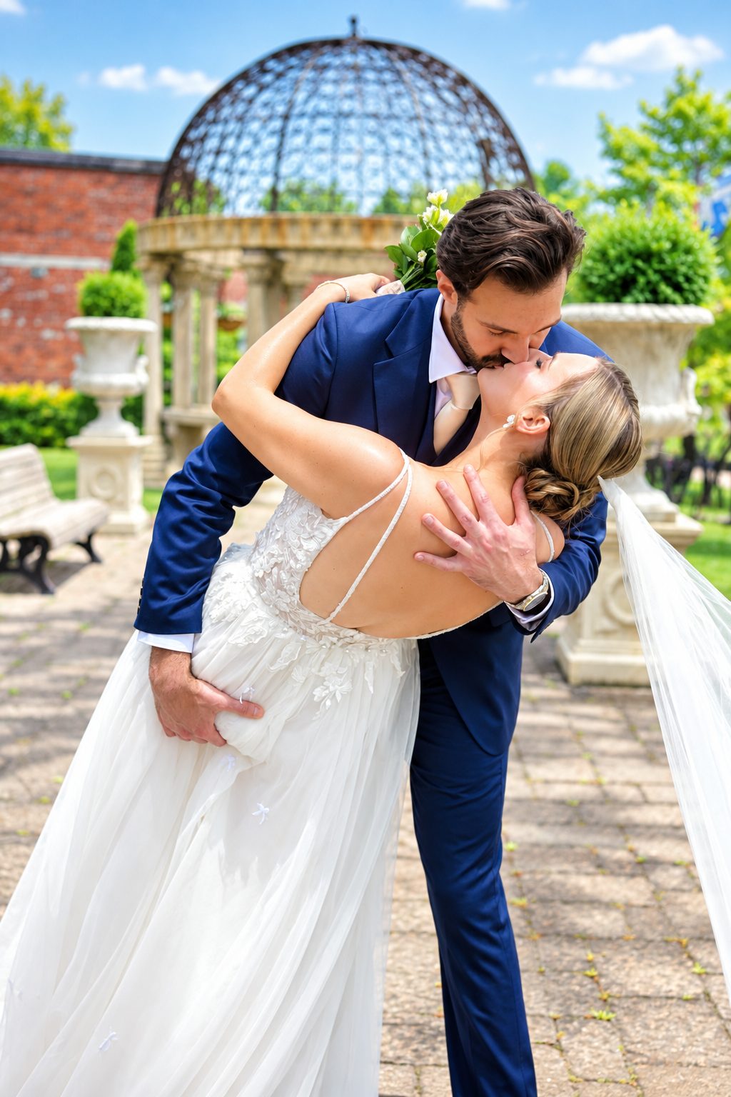 Shadi dipping Laurie for a kiss by the gazebo