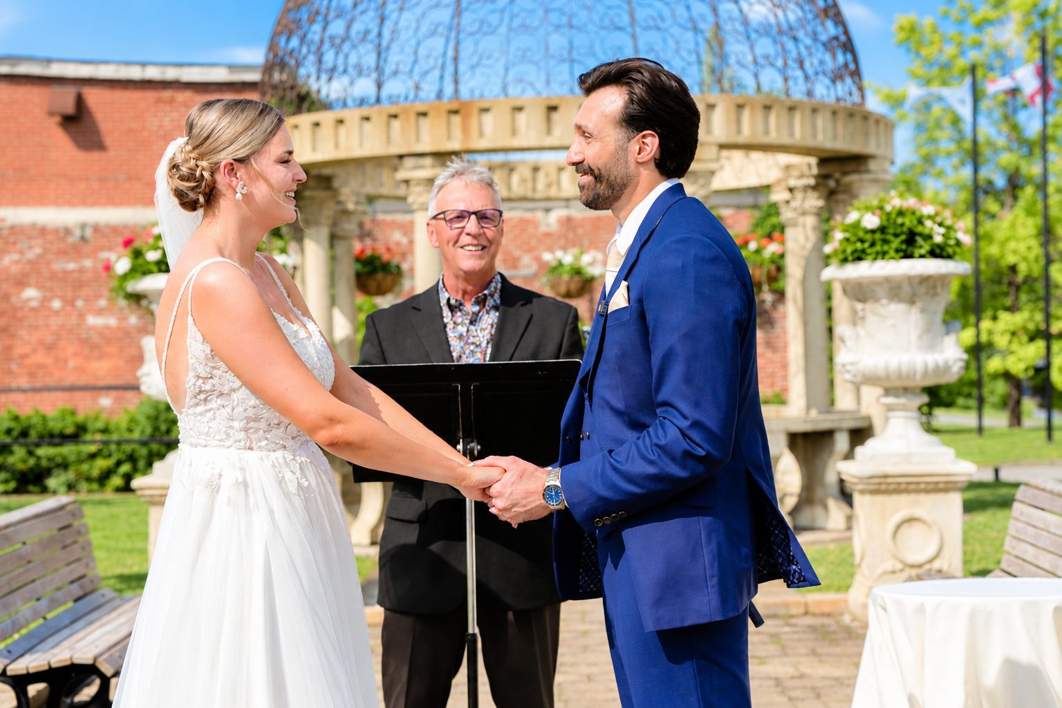 Laurie and Shadi exchanging vows under the gazebo