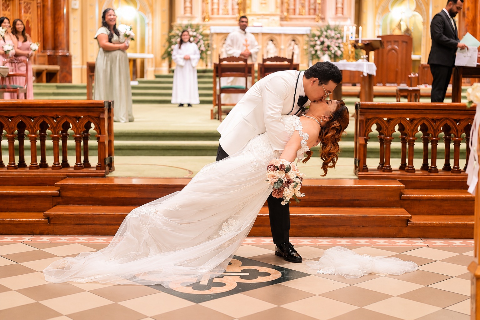 Daryl dipping Mae for a kiss at the altar