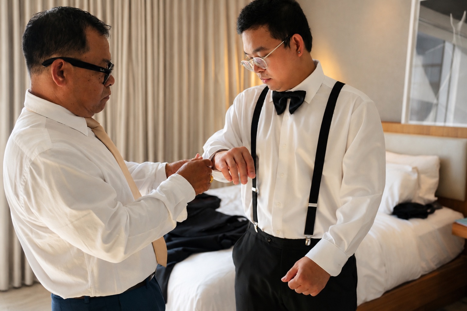 Daryl's cufflinks being fastened before the ceremony