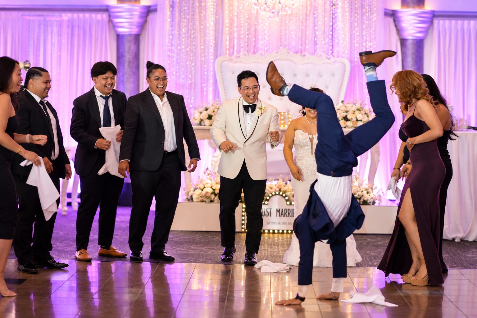 The wedding party dancing with Mae and Daryl