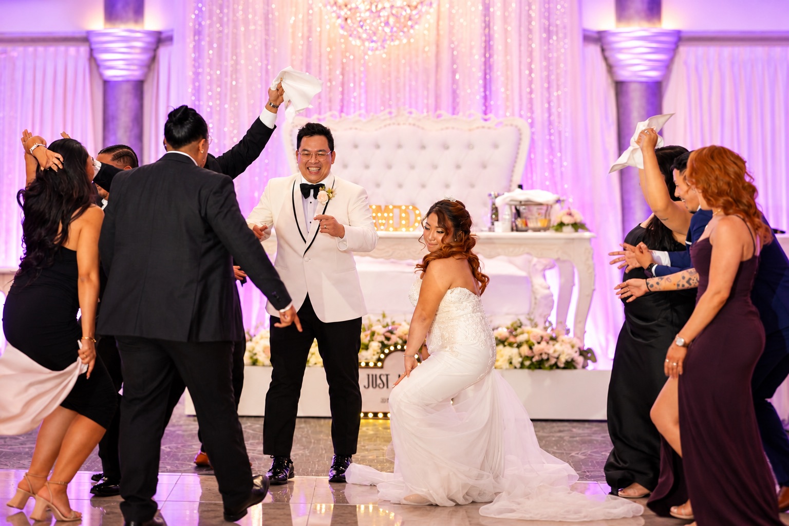 Mae and Daryl celebrating on the dance floor