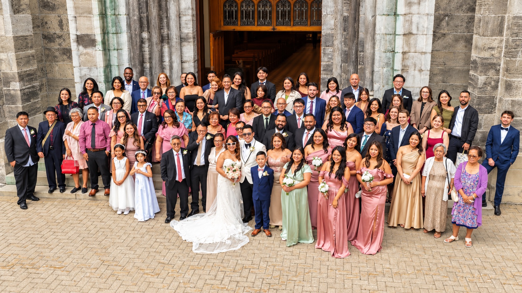 Mae and Daryl with their families outside the church
