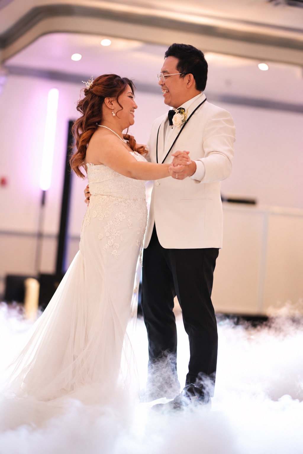 Mae and Daryl laughing during their first dance