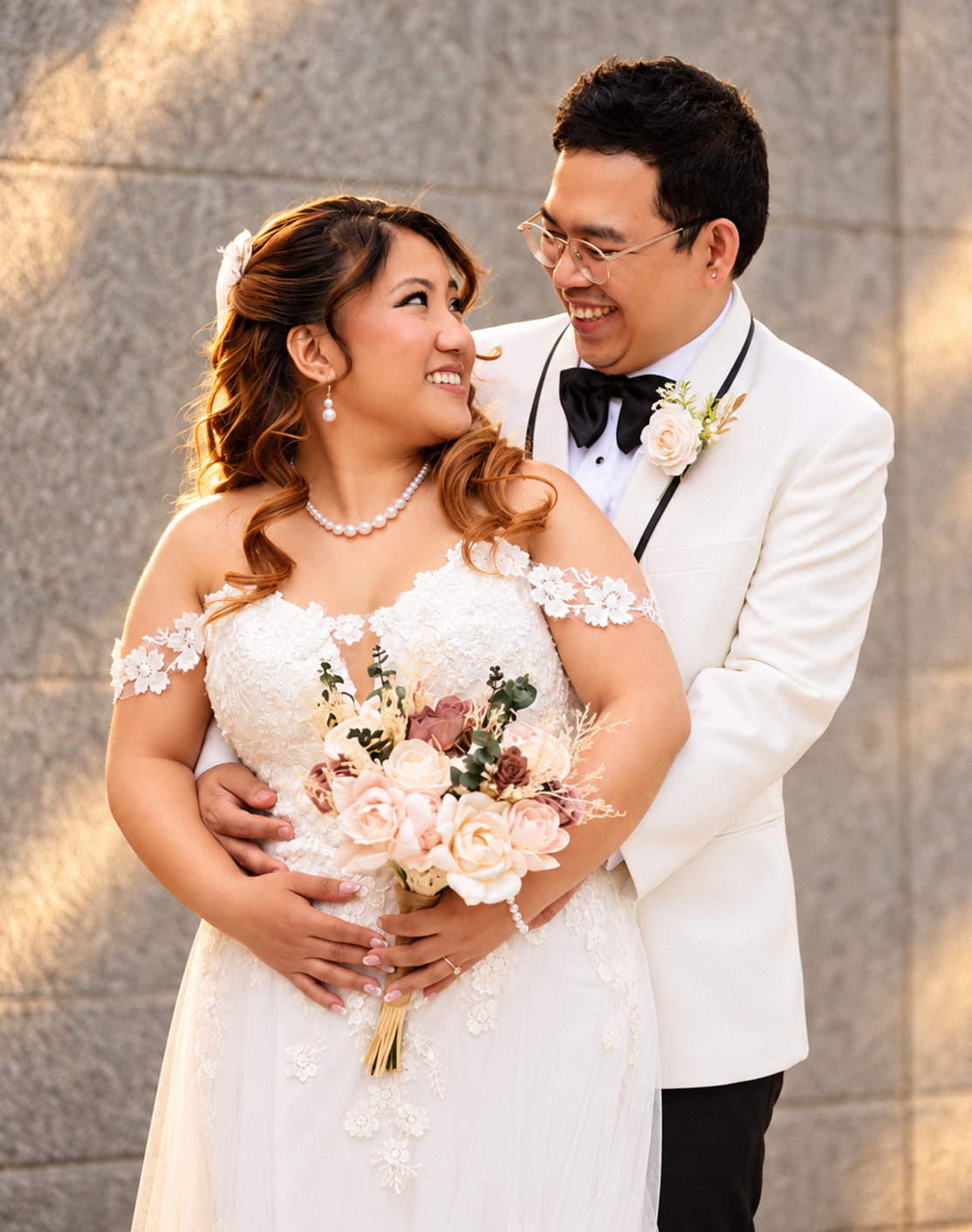 Mae and Daryl smiling together at their wedding