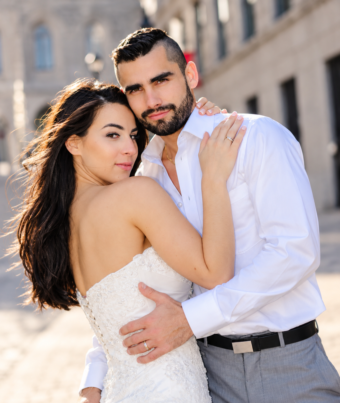 Sara and Kevin embracing in Old Montreal